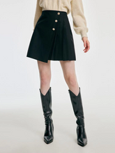a lady in black mini skirt with boots